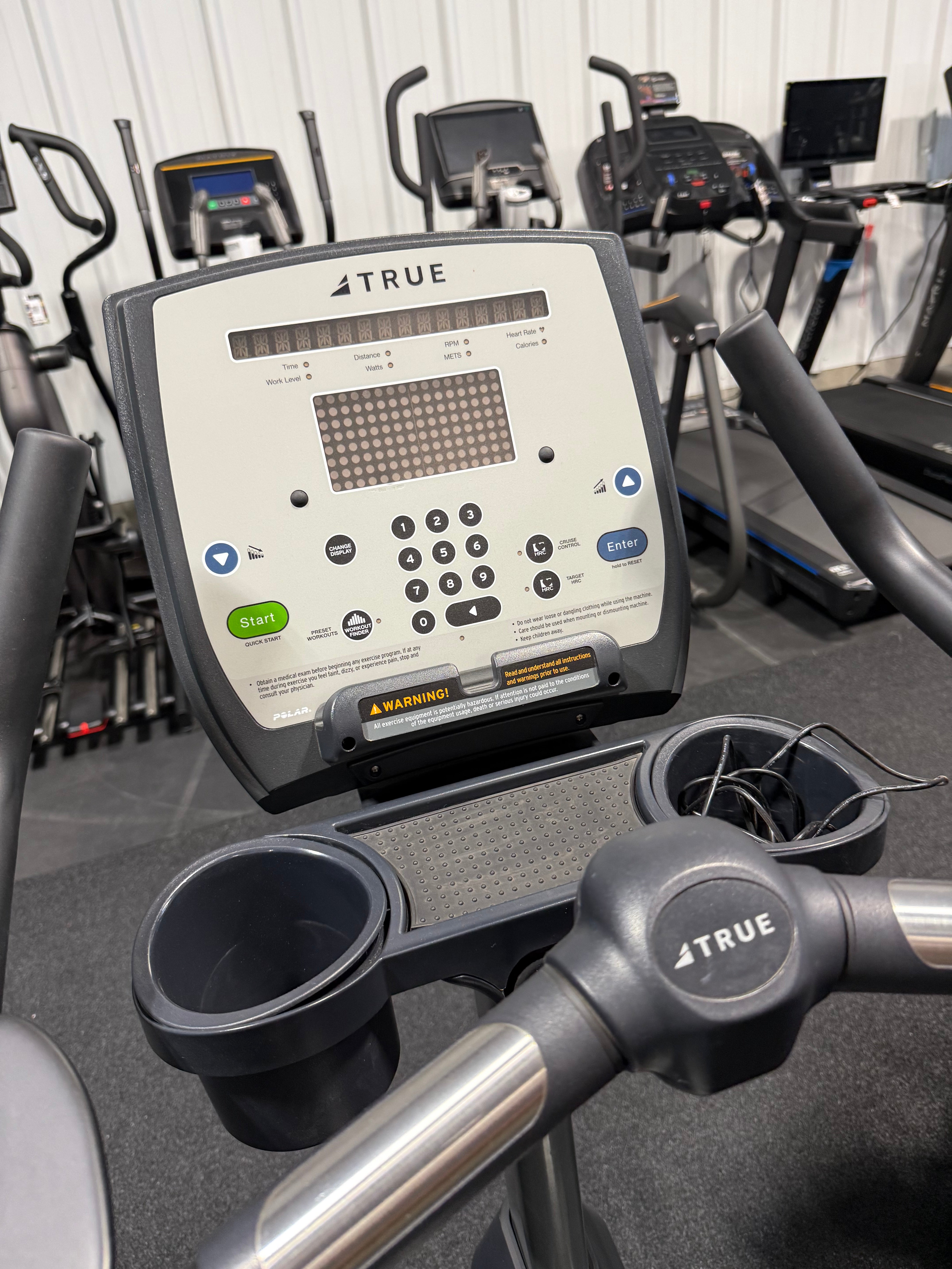 Used True Fitness E900 Upright Bike