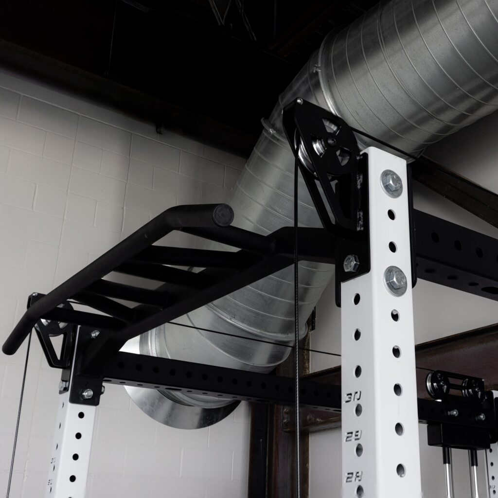 Low row performed on the Build Limitless 6-Post Functional Trainer