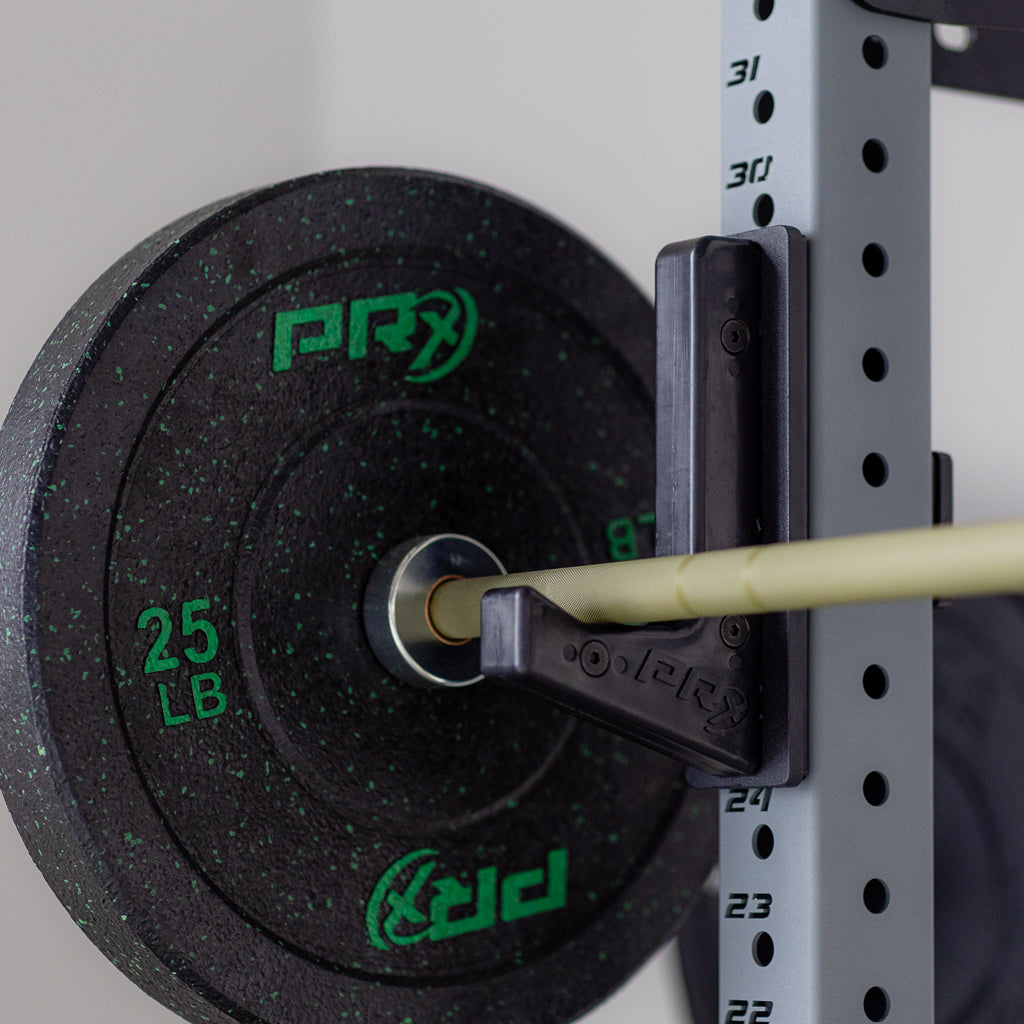 Barbell resting in the PRx 3x3 Sandwich J-Cups