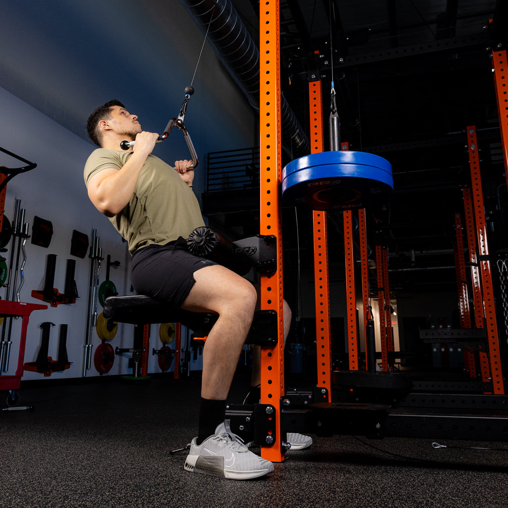 PRx Knee Keeper anchoring the feet for abdominal work