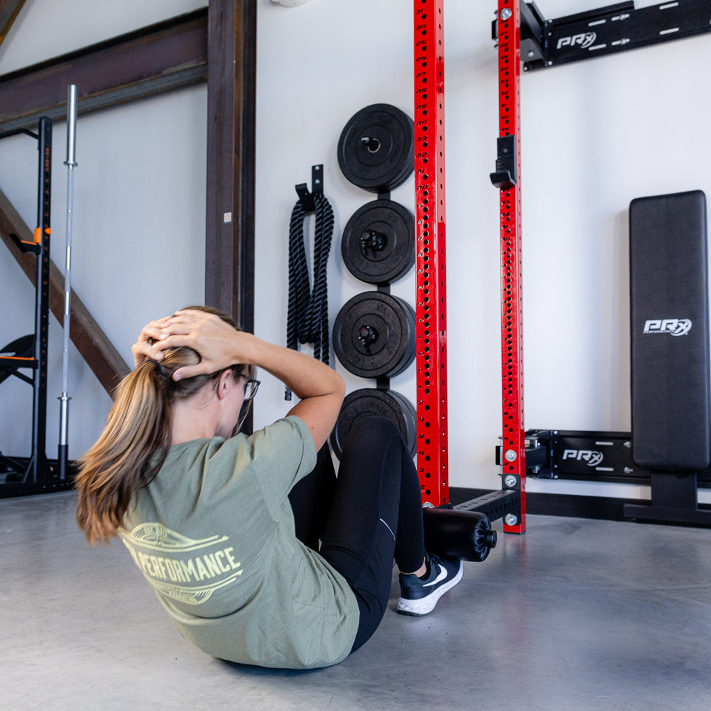PRx Knee Keeper installed in a home gym rack setup