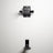 Golf bag hanging off the floor on the PRx wall-mounted storage in a garage