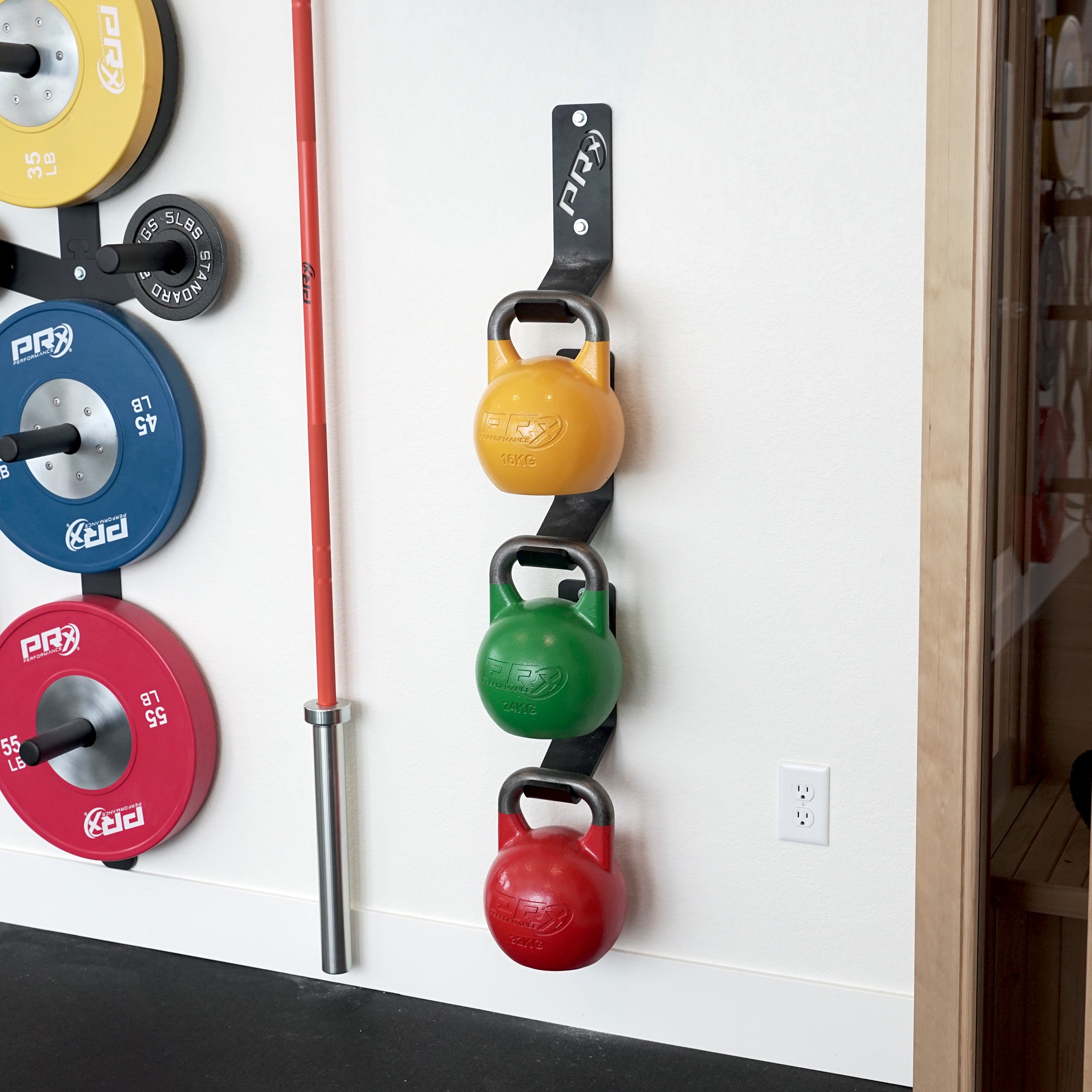 Three PRx Kettlebell Storage units stacked on a wall