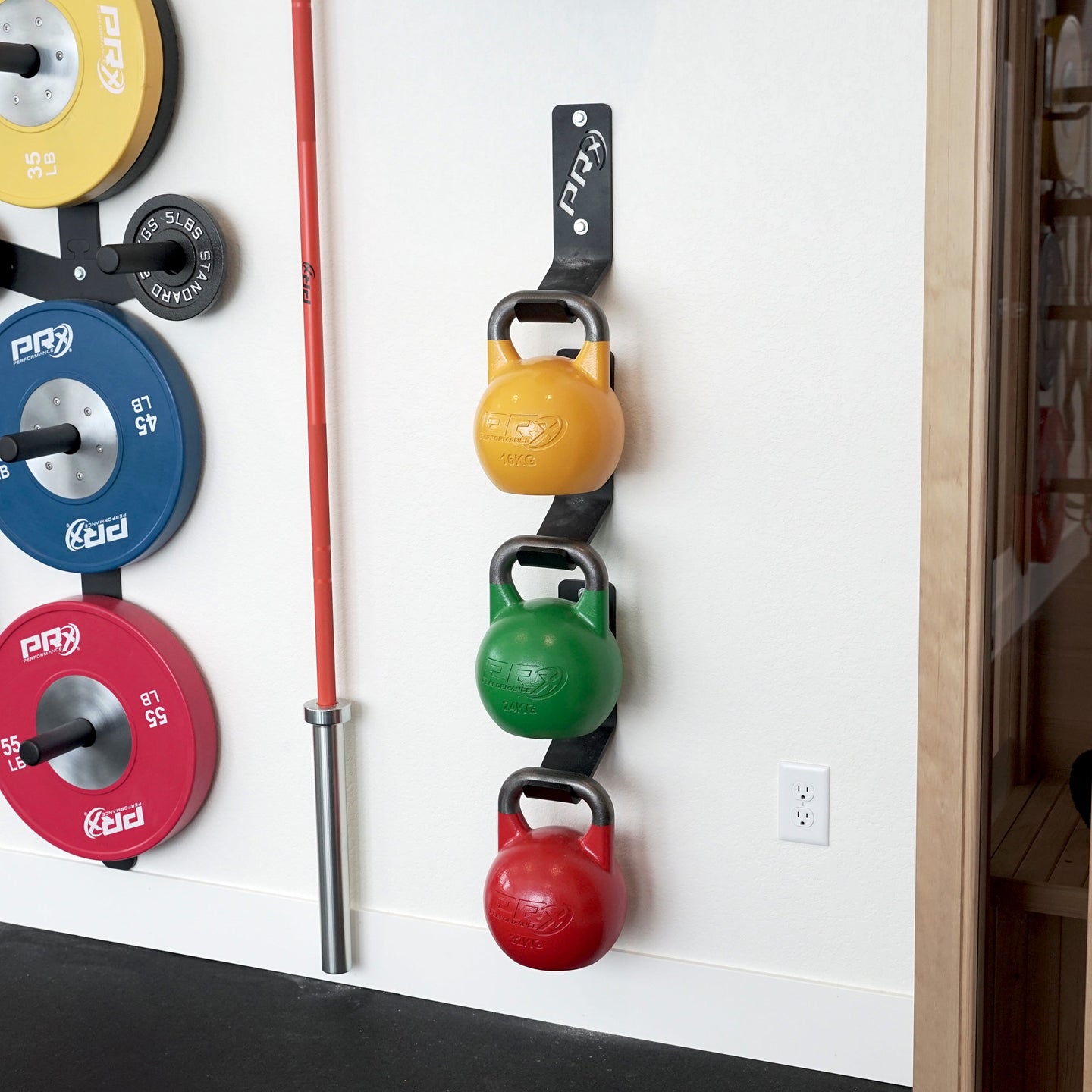 Three PRx Kettlebell Storage units stacked on a wall