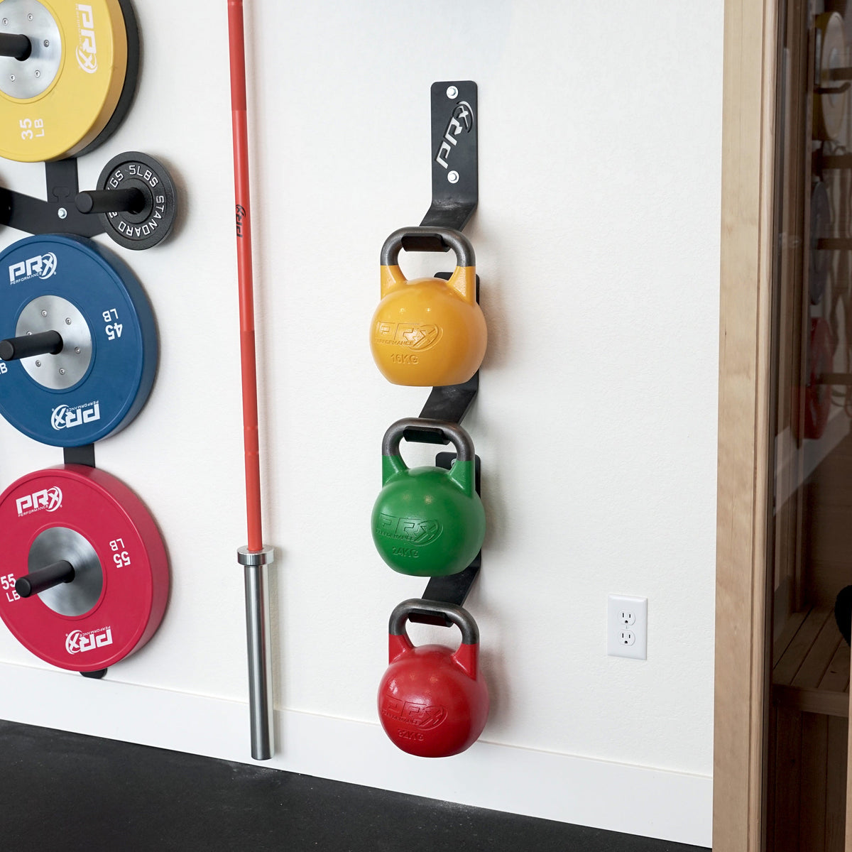 Three PRx Kettlebell Storage units stacked on a wall