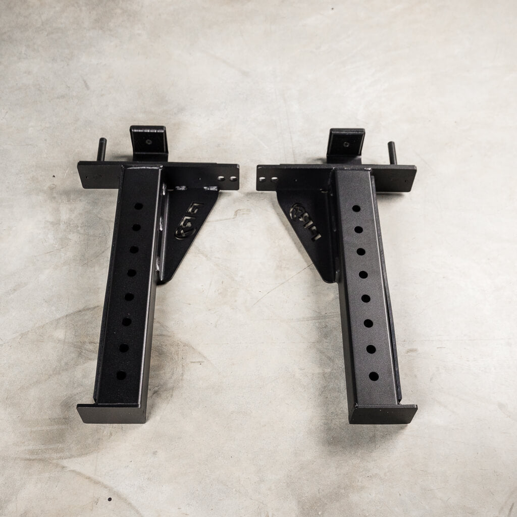 PRx 3x3 Spotter Arms pinned to the front of a Profile PRO rack