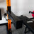 PRx 3x3 Spotter Arms catching a loaded barbell in a home gym