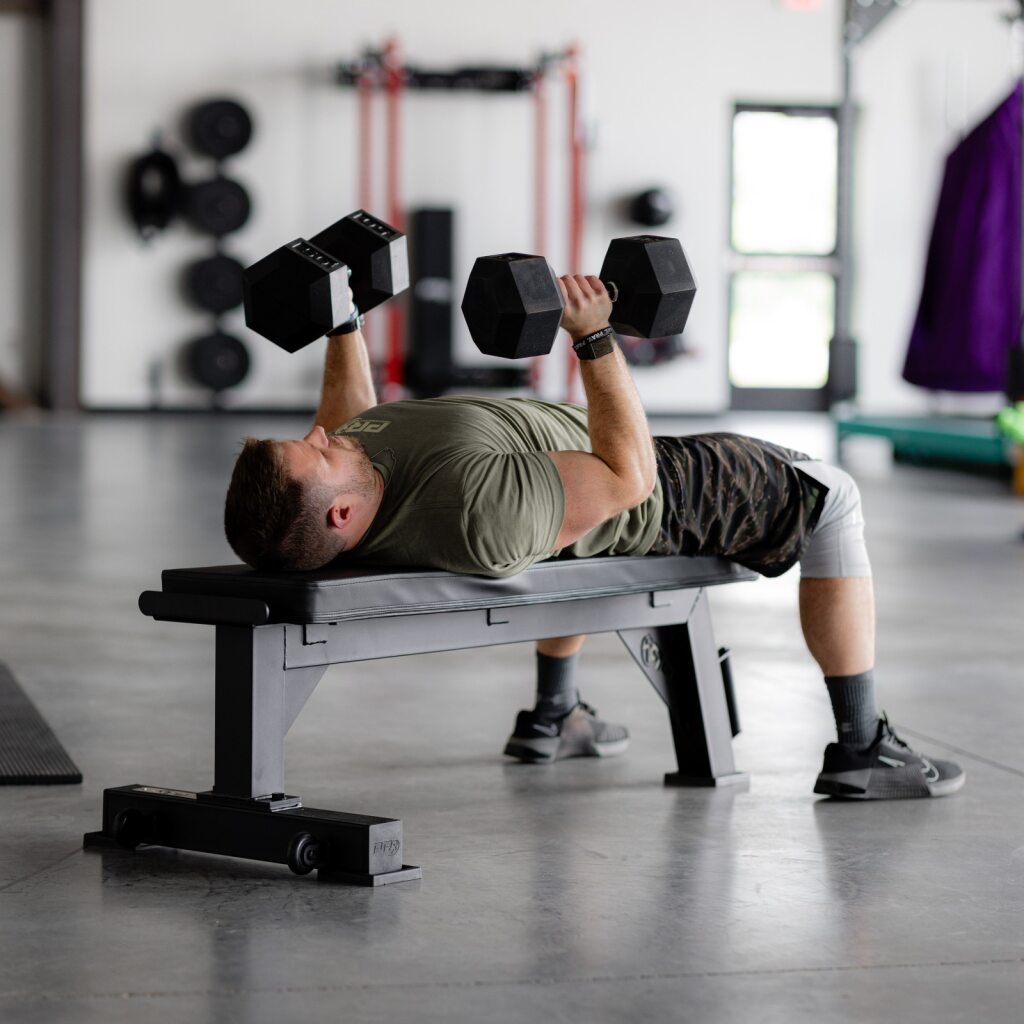 PRx Anchor Weight Bench knurled handle and bumper plate detail