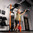 Athlete pressing with PRx Profile Halo Arms in a home gym