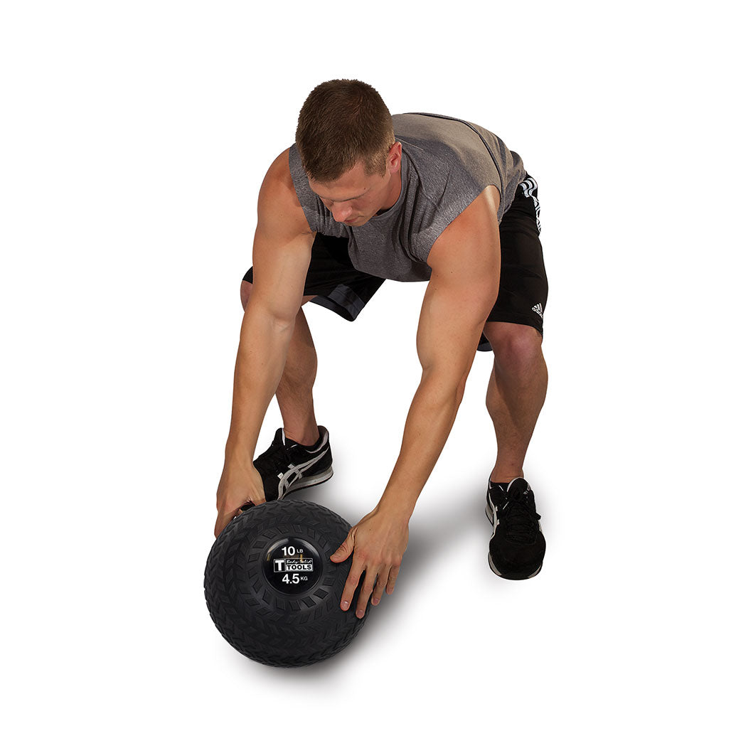 Body-Solid Tools Tire Tread Slam Balls, from 10 to 30 lbs. - in use