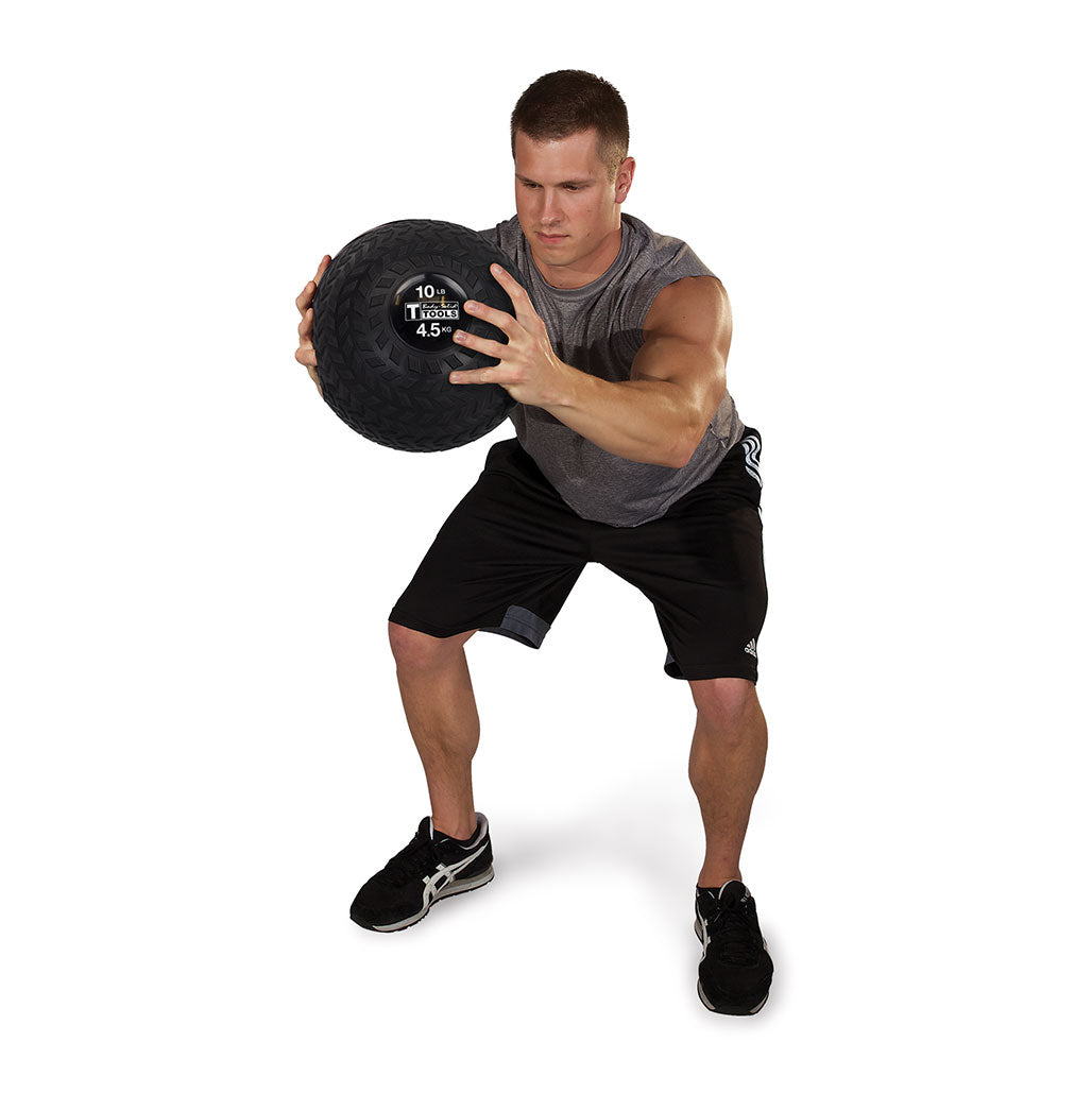 Body-Solid Tools Tire Tread Slam Balls, from 10 to 30 lbs. - in use