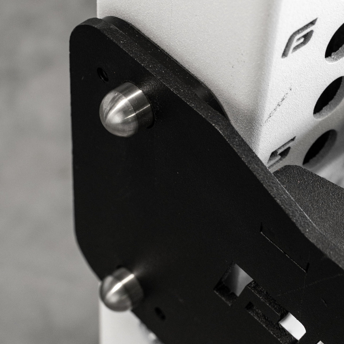 PRx Mag Pin being pulled from a rack attachment by hand
