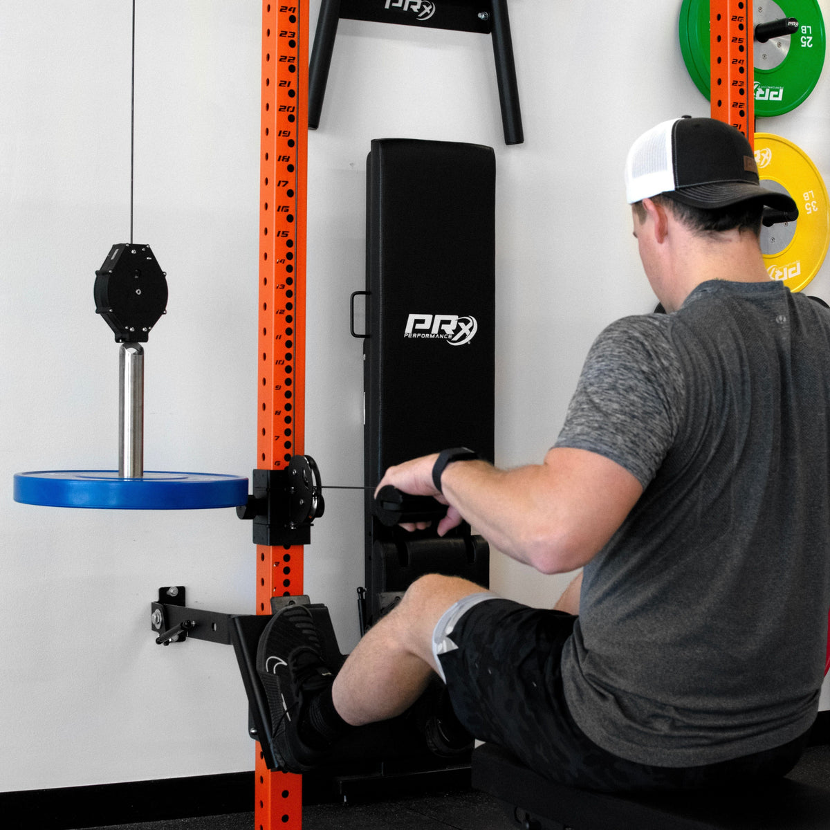 Lifter bracing on the PRx Footplate during a low cable row