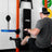 Lifter bracing on the PRx Footplate during a low cable row