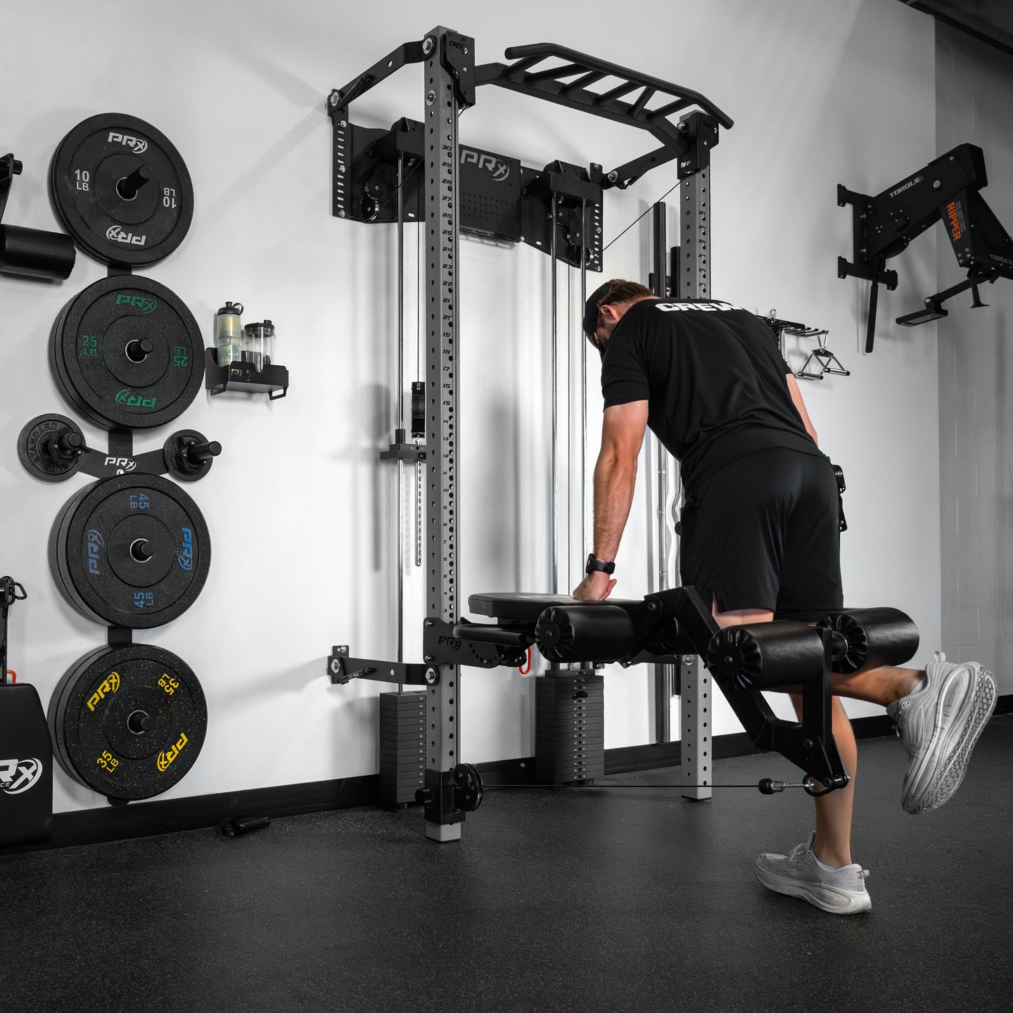 PRx Profile PRO ARK rack with barbell loaded in the J-cups