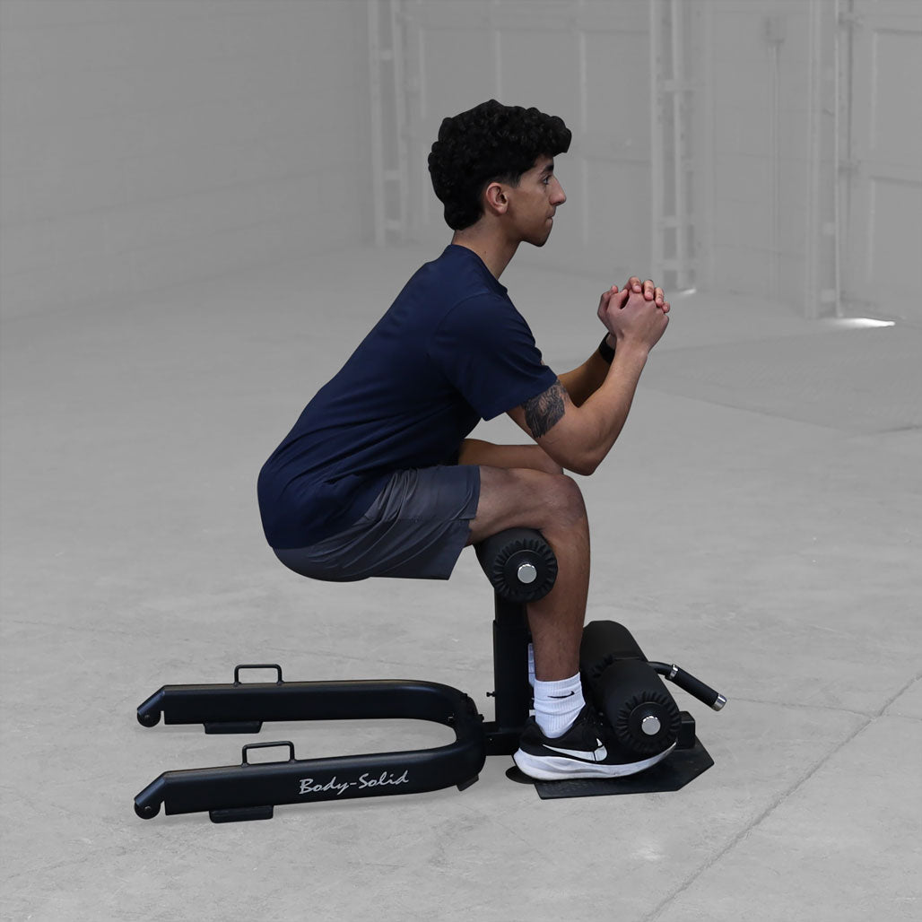 Body-Solid Sissy Squat - in use, squat side view