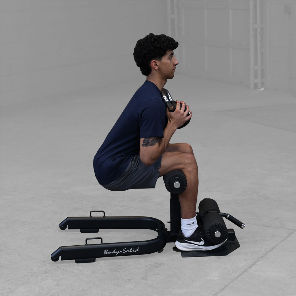 Body-Solid Sissy Squat - in use, squat