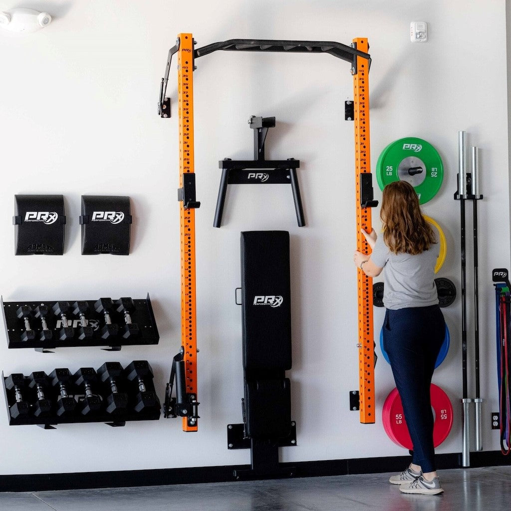 Folding the PRx Profile PRO Squat Rack flat against the wall