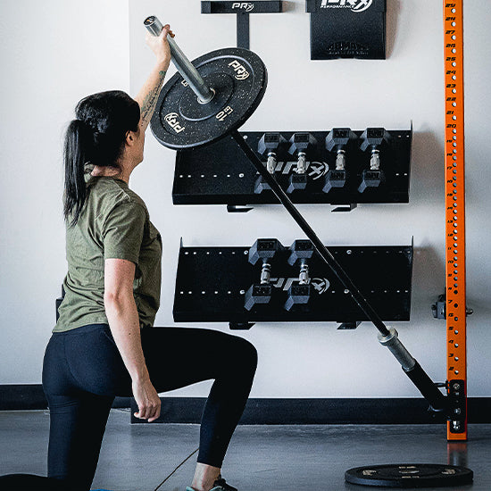 PRx Profile Landmine Attachment with an Olympic barbell in the 9 inch sleeve