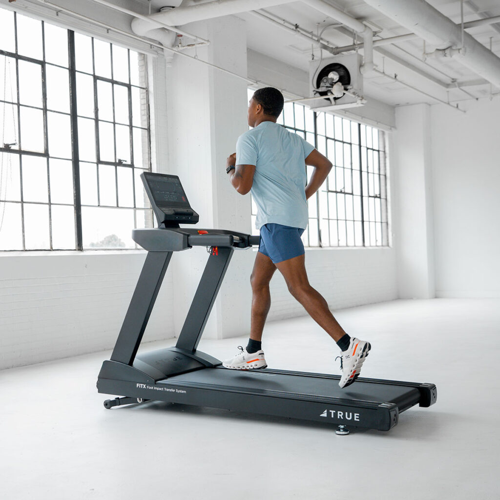 True Fitness Launch treadmill in a fitness room