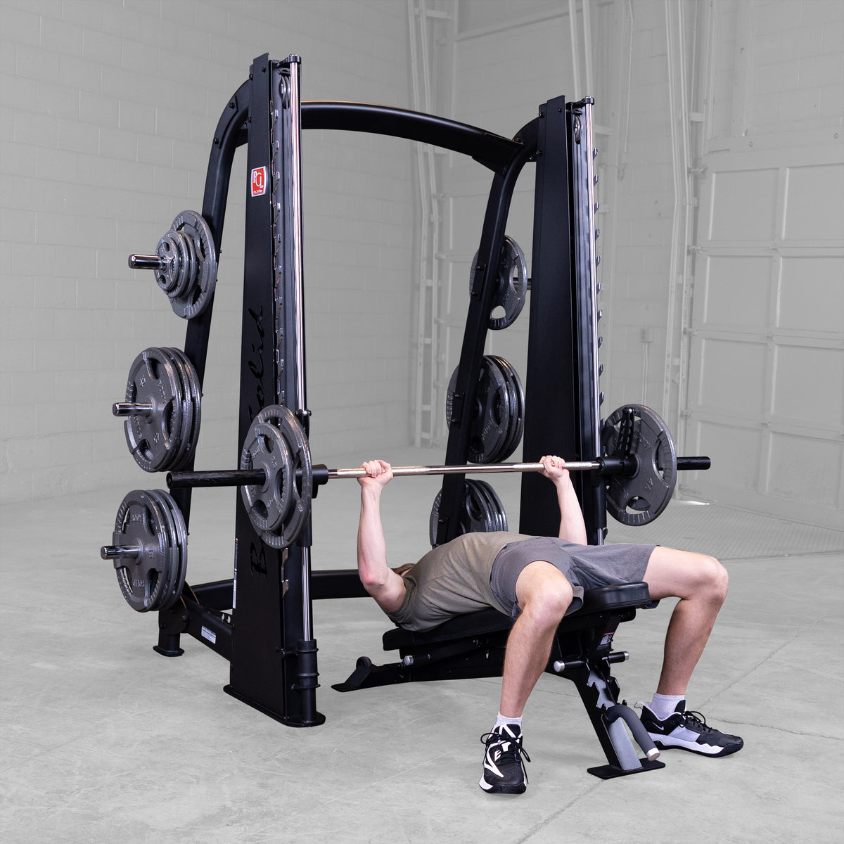 Body Solid Pro ClubLine Counter Balanced Smith Machine by Body-Solid, Black Finish - in use
