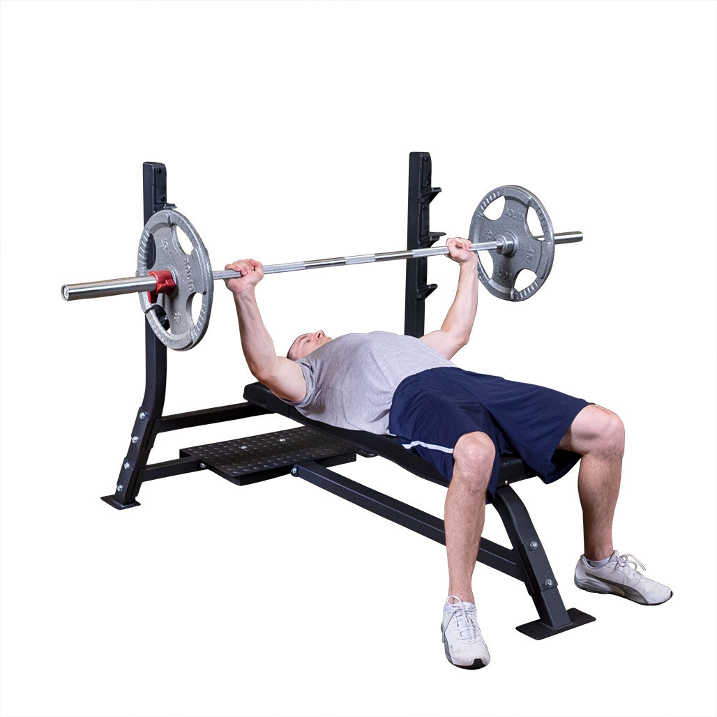 Pro Clubline Fixed Olympic Flat Bench by Body-Solid - in use, bench press