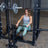 Body-Solid Pro ClubLine Half Rack Lat Attachment - in use, seated exercise