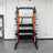 Weight plate storage pegs and barbell storage on the Trident Rig