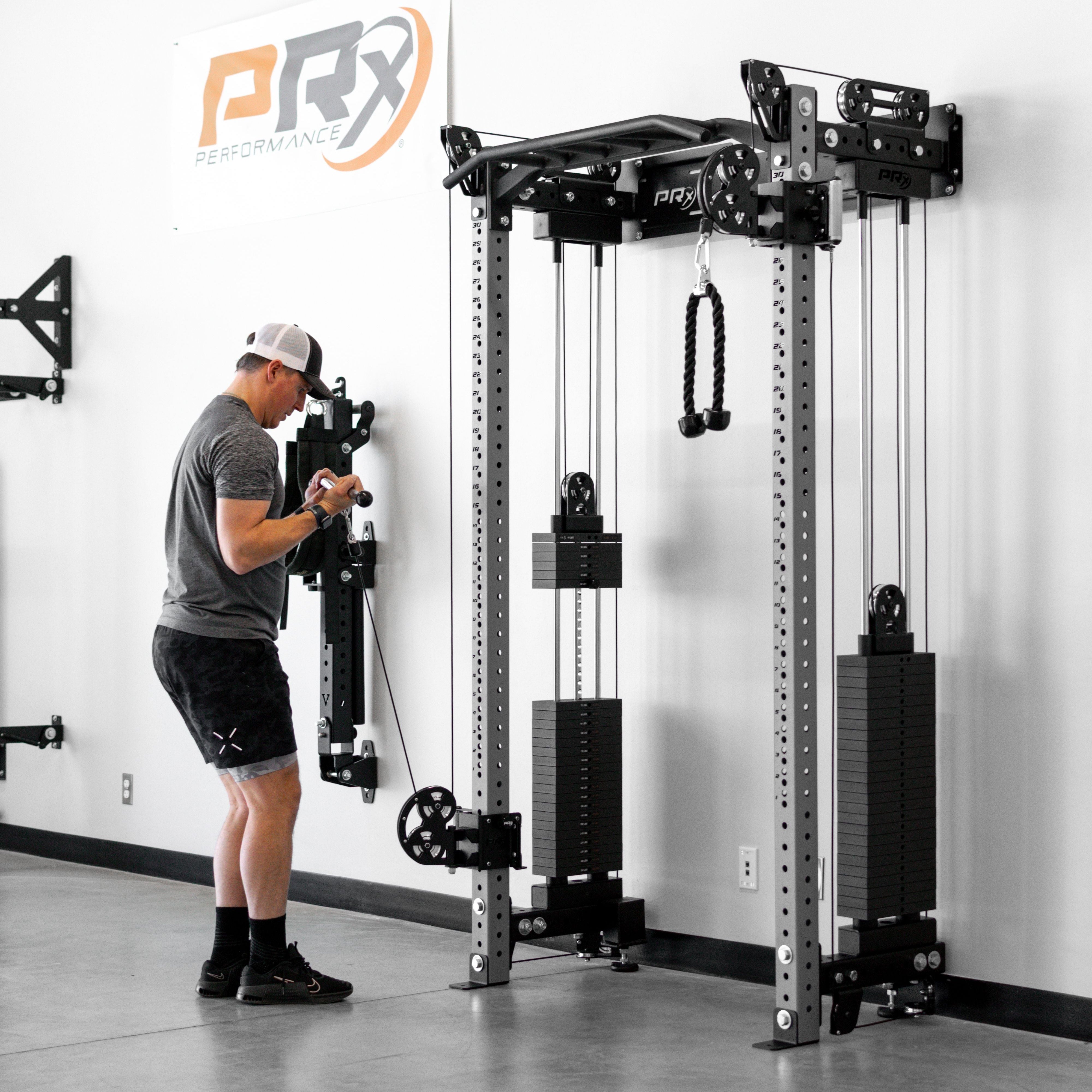 Wall mounted functional trainer showing the shallow depth against the wall