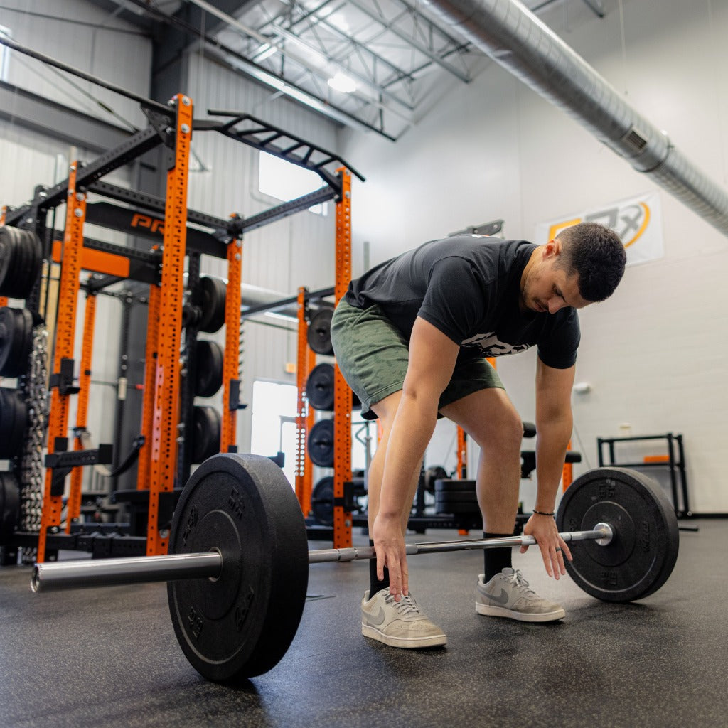 PRx Swift Barbell loaded in a rack