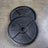 Cast iron Olympic plate face showing weight marking