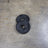PRx cast iron Olympic plates in multiple sizes side by side