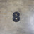 PRx cast iron Olympic plates loaded on a barbell
