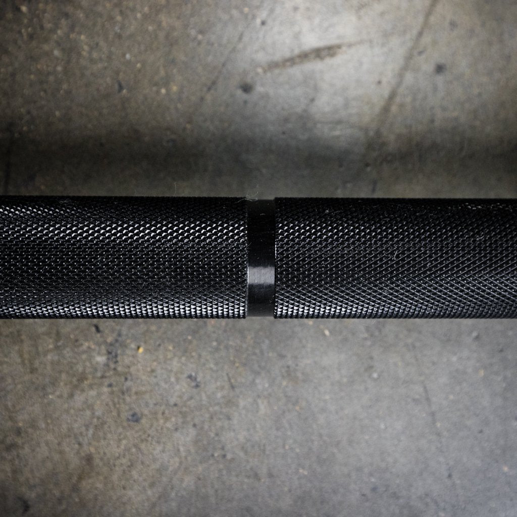 PRx Dakota Power Barbell aggressive diamond knurling close up