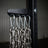 Black powder coated Build Limitless chain and band storage bar with four holes