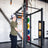 PRx Build Limitless barbell hanger shown in a home gym rack setup
