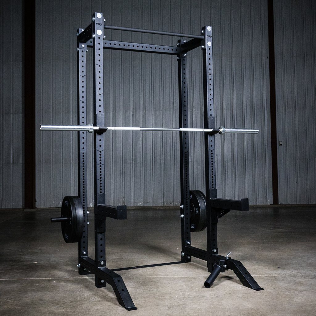 Bumper plates stacked on Build Limitless storage pegs in a home gym