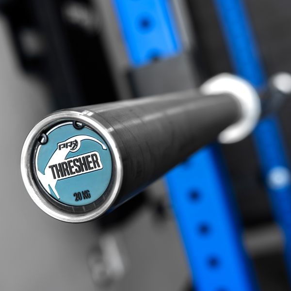 PRx Stainless Thresher Bar in a home gym setting