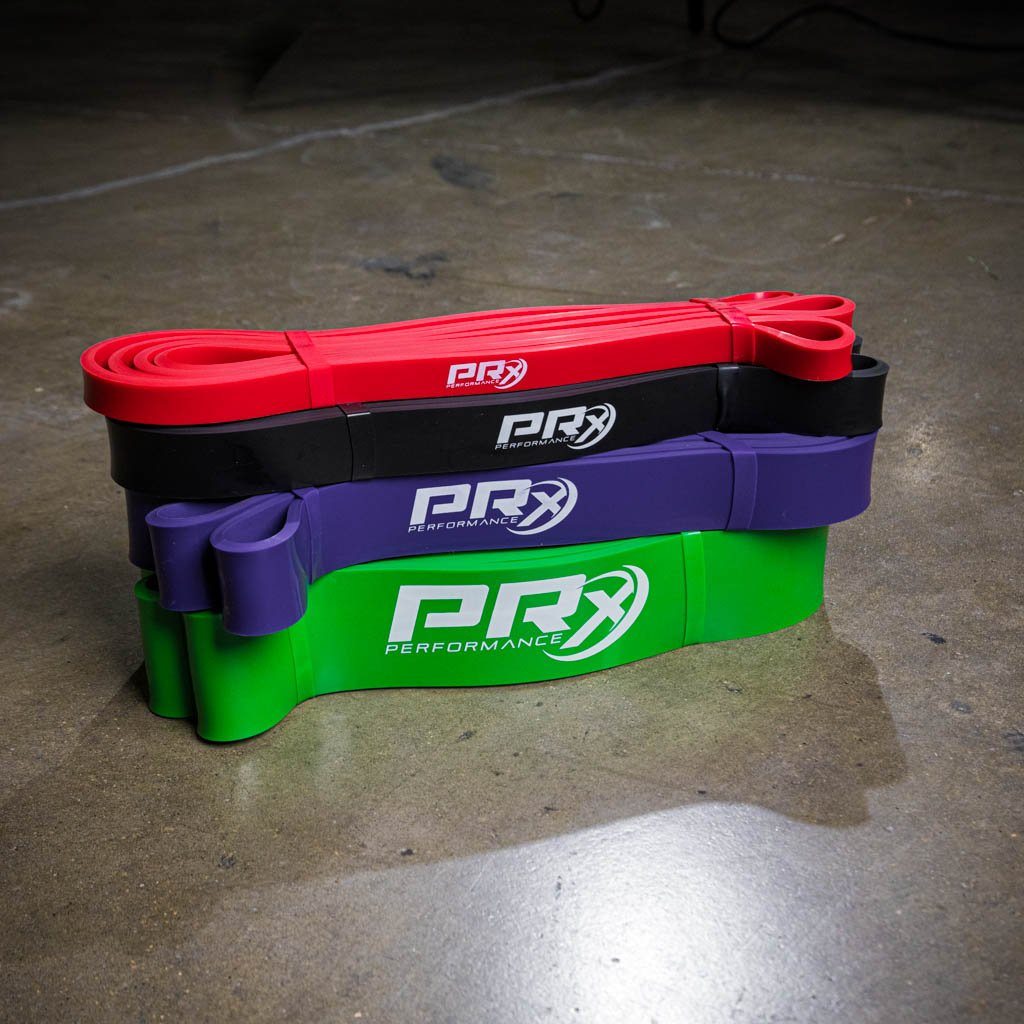 PRx Mobility Band looped over a rack for assisted pull-ups