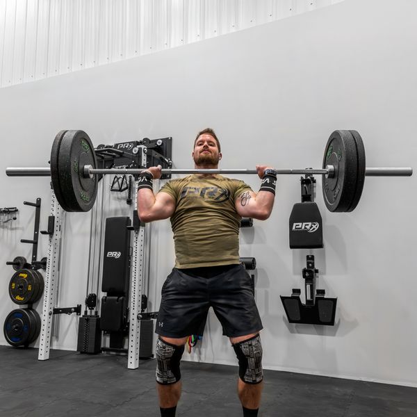 PRx Mako Olympic Barbell loaded with bumper plates