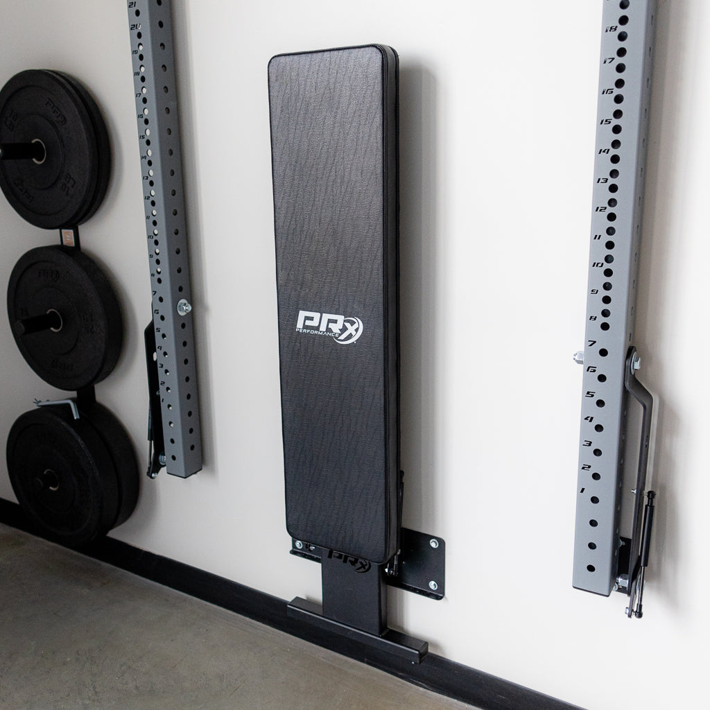 Lifter bench pressing on the PRx Profile Flat Folding Bench