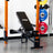 PRx Profile Incline Folding Bench folded flat against the wall
