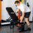 PRx Profile Incline Folding Bench in use inside a wall-mounted rack