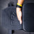 PRx Profile Incline Folding Bench stowed in a garage gym