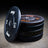 PRx Color Fleck Bumper Plates showing black rubber with colored fleck
