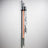 Barbell sleeve resting in the 1.25 inch slot of a PRx hanging bar storage unit