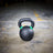 PRx powder coated kettlebells in a home gym setup