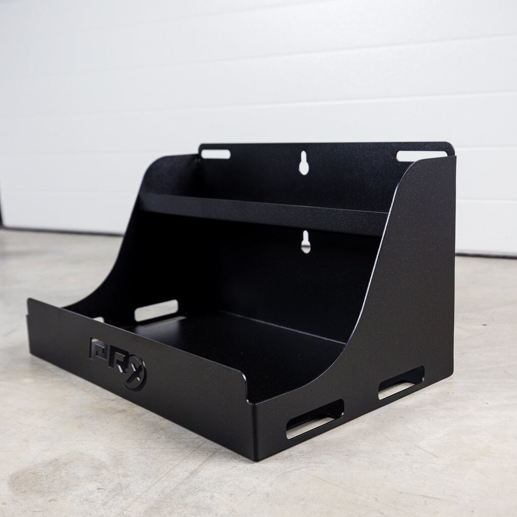 PRx junk drawer installed beside a squat rack in a garage gym