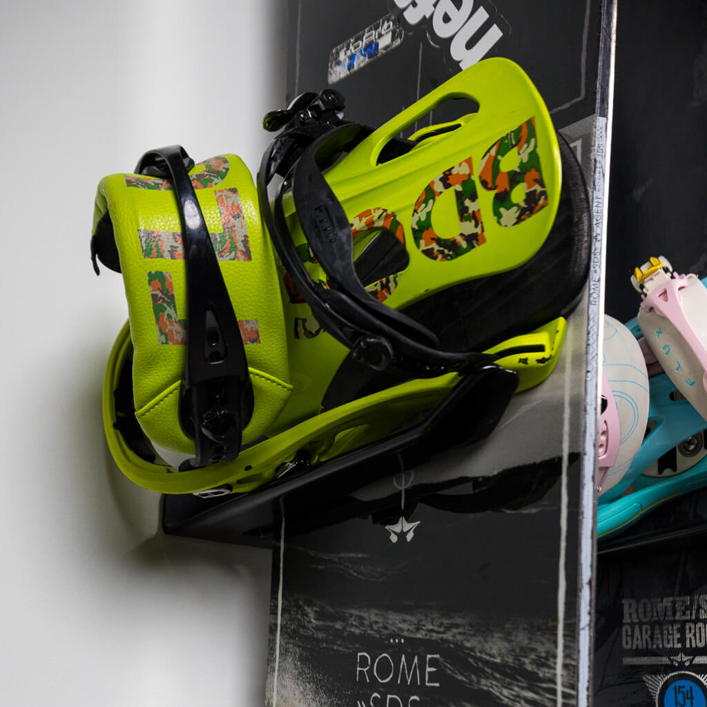 PRx Ski and Snowboard Storage holding multiple pairs of skis in a mudroom