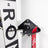 PRx Ski and Snowboard Storage installed above a home gym bench